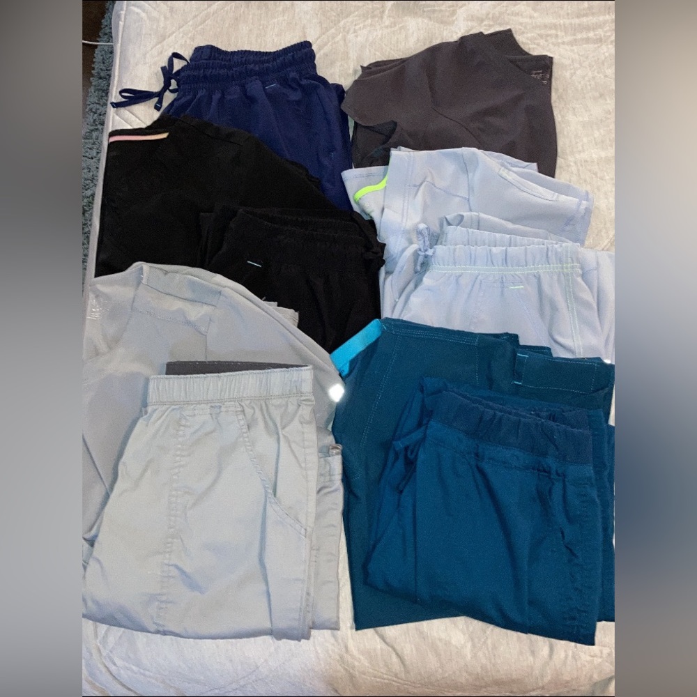10 scrub pieces — various brands, colors, & sizes. 4 matching sets can be made.